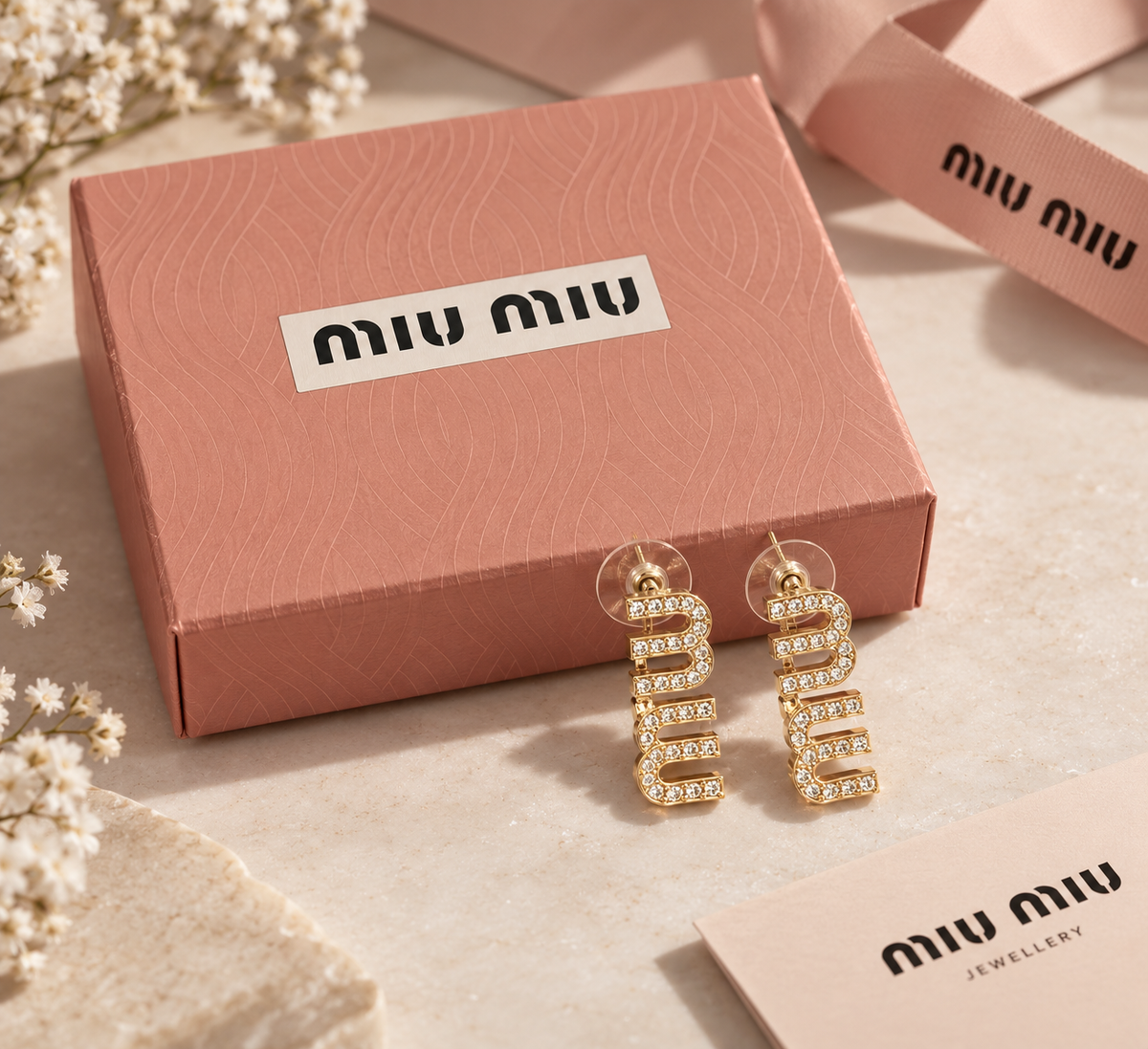 Σκουλαρίκια miu miu